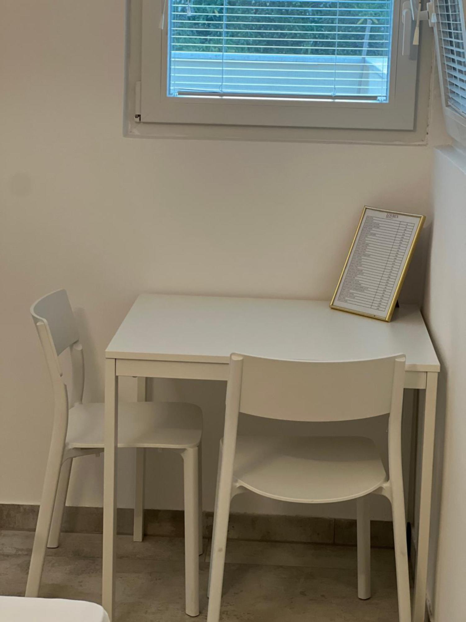 Apartmani Lovren Новаля Екстериор снимка